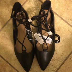 NWT lace up black flats
